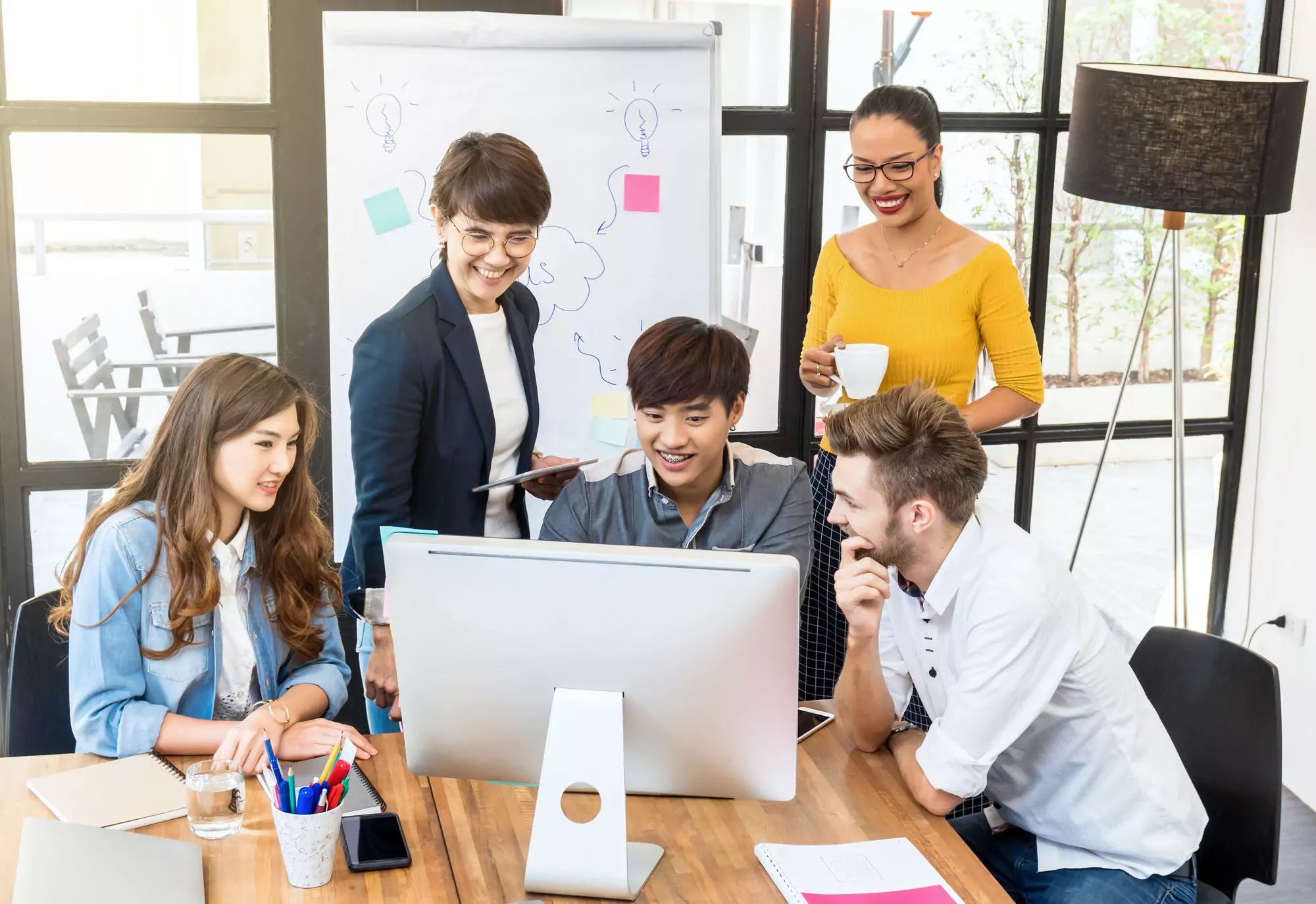 Group Of Asian and Multiethnic Business people with casual suit working