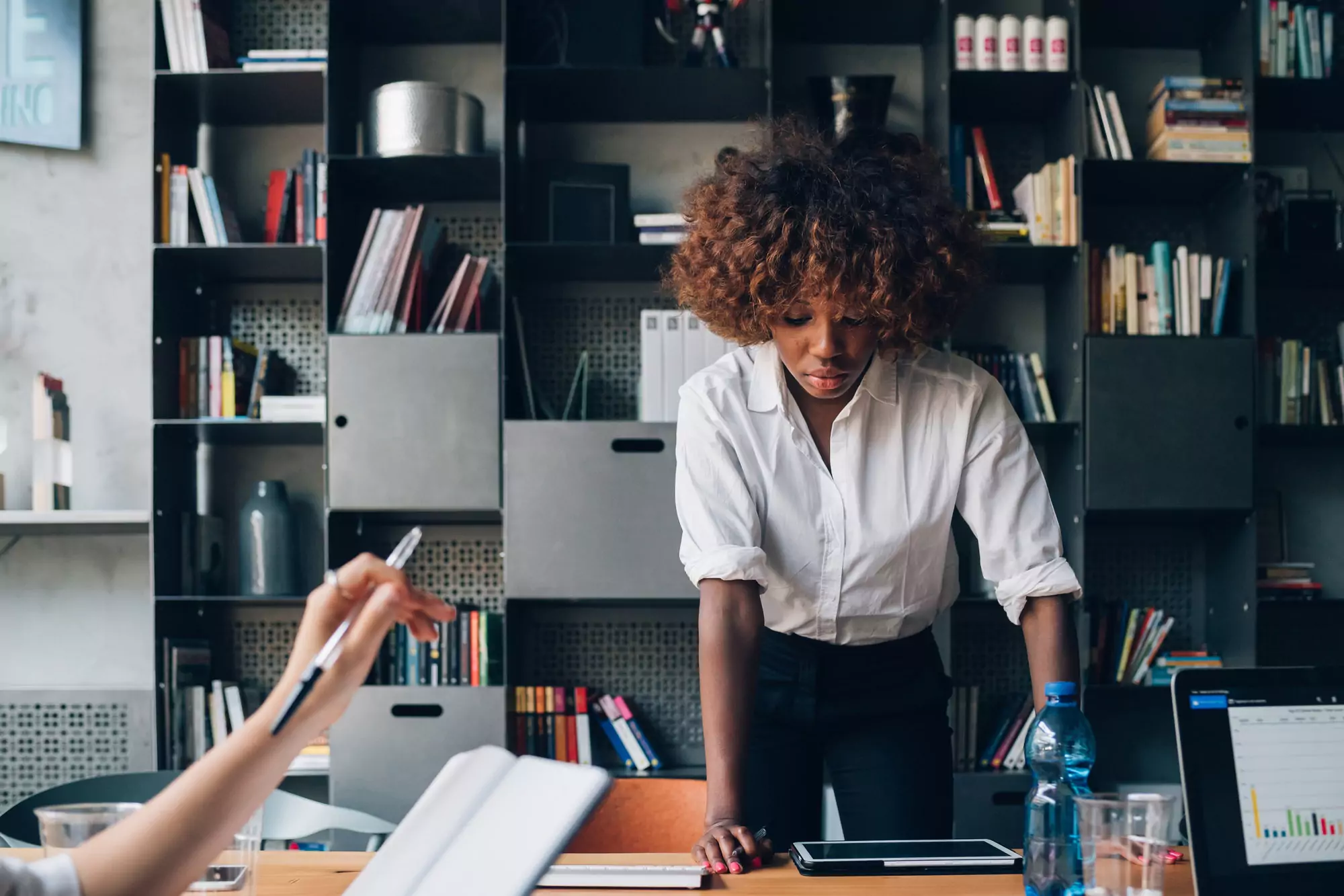 young african businesswoman working in coworking office with colleagues
